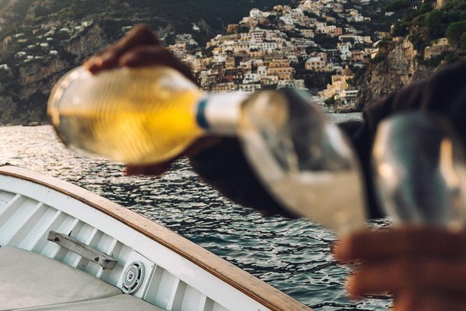 1.5-Hour Amalfi Sunset Cruise – Private Tour with Prosecco - Positano or Praiano: the dock-and-board rhythm at 6 pm
