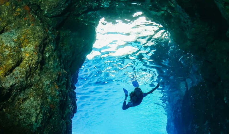 Amalfi Coast: Boat and Snorkeling Tour with Fruit & Drinks - Praiano’s Africana Grotto and the blue-water effect