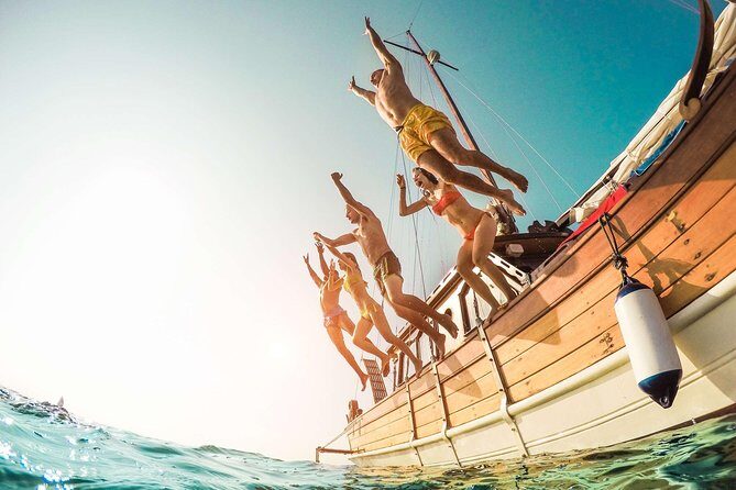 Amalfi Coast & Positano: Boat Tour with Snorkeling & Drinks - Stop 4: Praiano and the Africana Grotto’s intense blue light