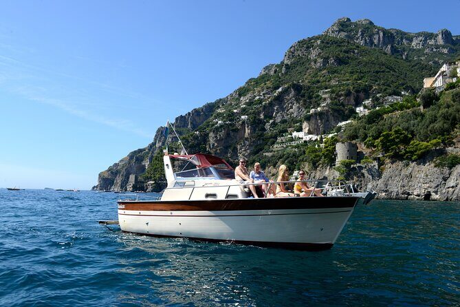Amalfi Coast Private Boat Day Tour from Sorrento - Sorrento coast cruising: ruins, towers, and Puolo bay views