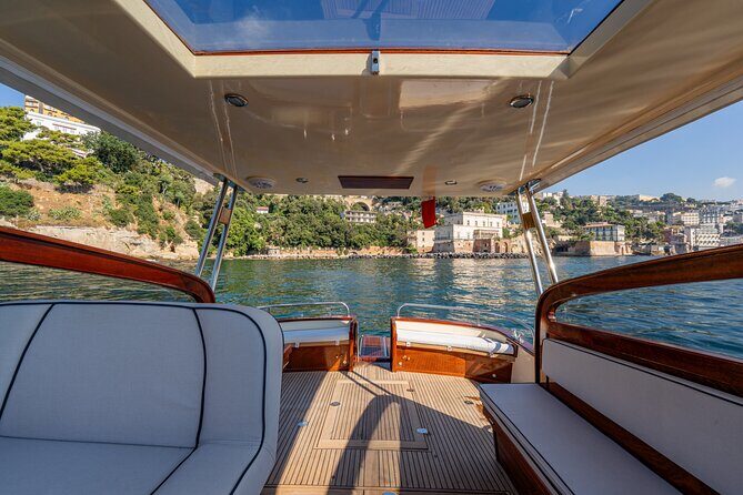 Amalfi Coast Semi Private Boat Day Trip from Sorrento - What’s included on board: skipper, drinks, snacks, and Prosecco