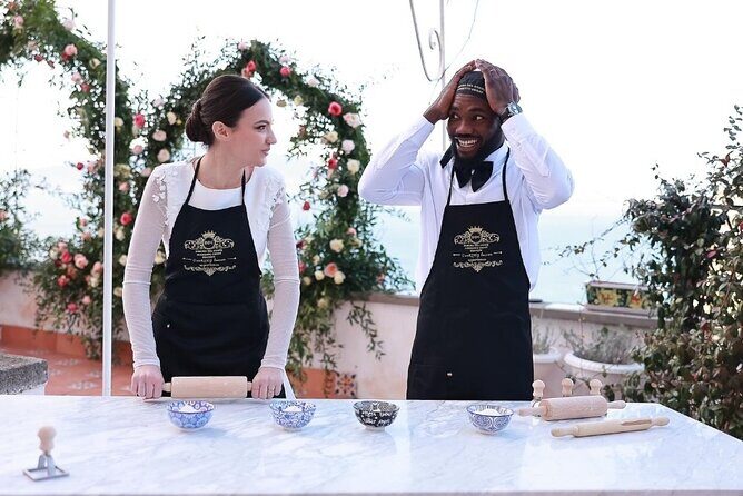 Authentic Pasta & Pizza Cooking Class with Sorrento Coast Pickup - Entering Dimora del Conte and stepping onto a terrace above the Gulf