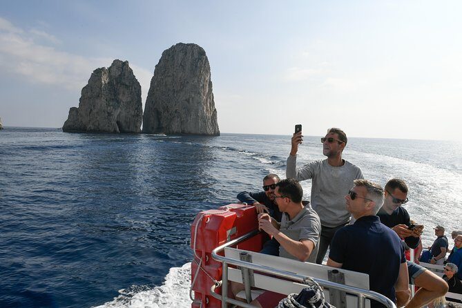 Capri and Anacapri Guided Tour with Limoncello Tasting from Capri - The boat cruise: Marvellous, White, and Green Grotto stops (and the views you came for)