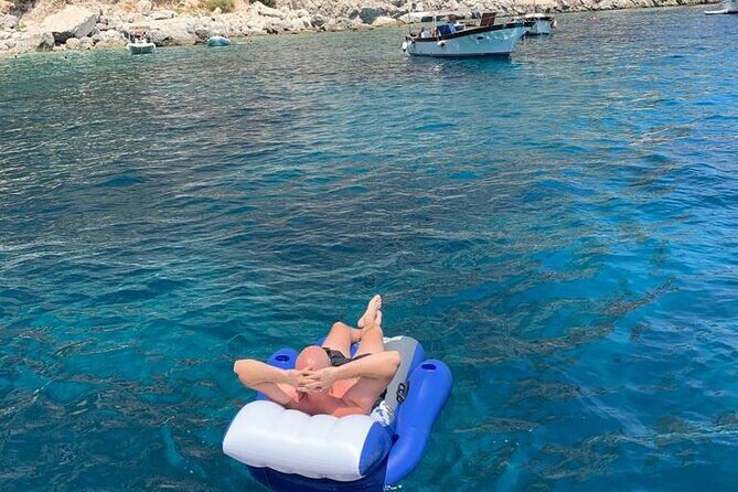 Capri Boat Tour and City Visit from Sorrento - Aperitif Time at Punta Ventroso and the Mermaid’s Rock Moment