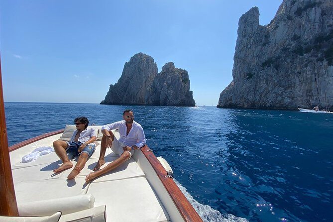 Capri Boat Tour: Grottoes, Swim & Sip Limoncello in a Small Group - Limoncello, Snacks, and the On-Board Mood