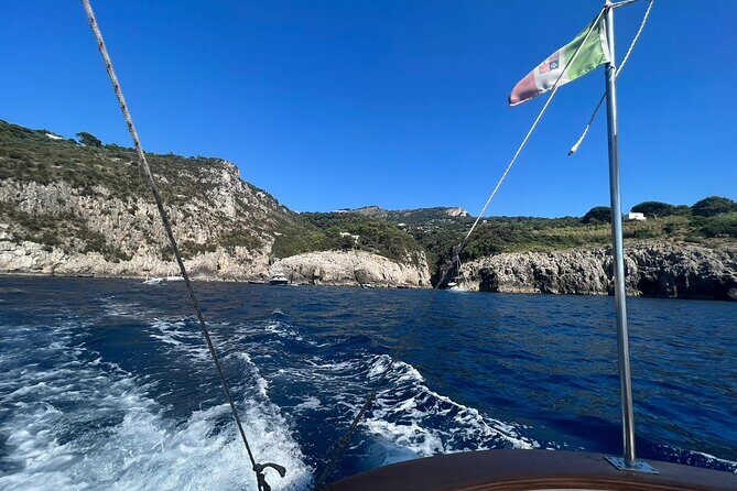 Capri by Boat private Comfortable tour - I Faraglioni and the Natural Arch: Iconic Capri in Short Hits