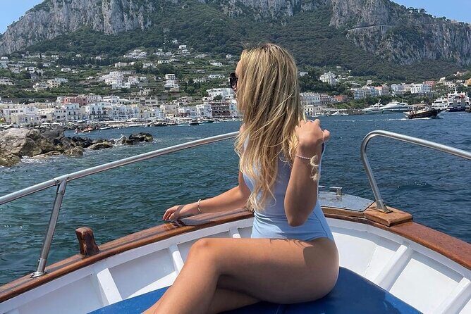 Capri by Private Boat – Hidden Caves & Swimming Stop - On-board experience: bottled water, photos, and captain style