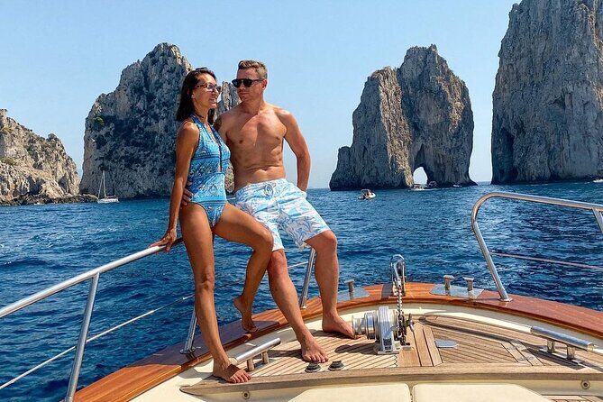 Capri: discover the beauties of the island aboard a Luxury Boat - Faraglioni of Capri: Classic Views, No Crowd-Pressured Queueing