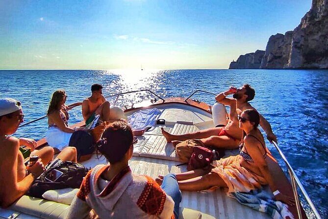 Capri Guided Boat Experience with Island Exploration and Transfer - Caves and color water: grotto time when conditions allow