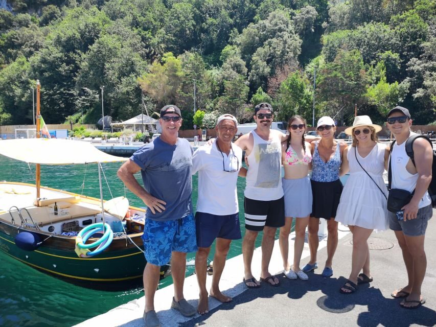 Capri: Island and Grottos Boat Cruise with Snacks and Drinks - Swim and snorkel break: what it’s like when the boat stops