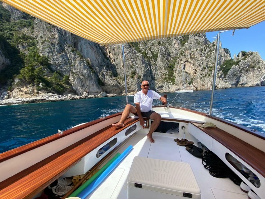 Capri: Island and Grottos Boat Cruise with Snacks and Drinks - Getting to HP Travel at Marina Grande without stress