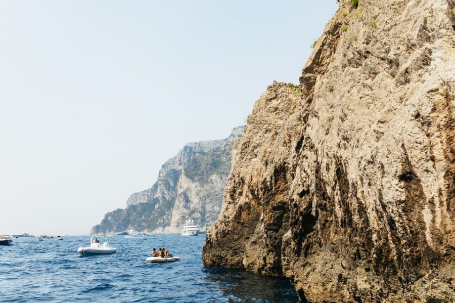 Capri: Island Boat Tour and Optional Blue Grotto Visit - Inside the Blue Grotto: rowboat transfer and the entry fee