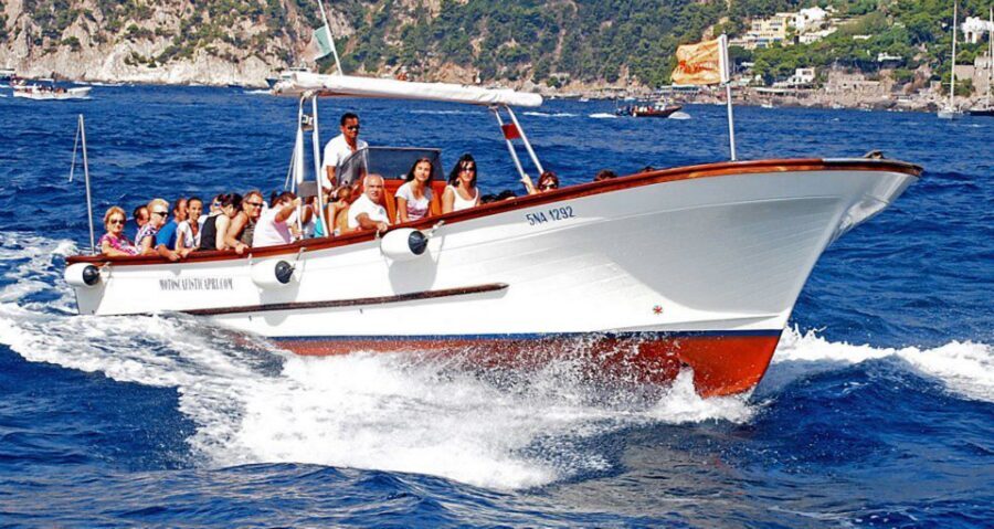 Capri: Island Boat Tour with Blue Grotto Stop - Blue Grotto: the €18 rowboat ticket, the lines, and the entry moment