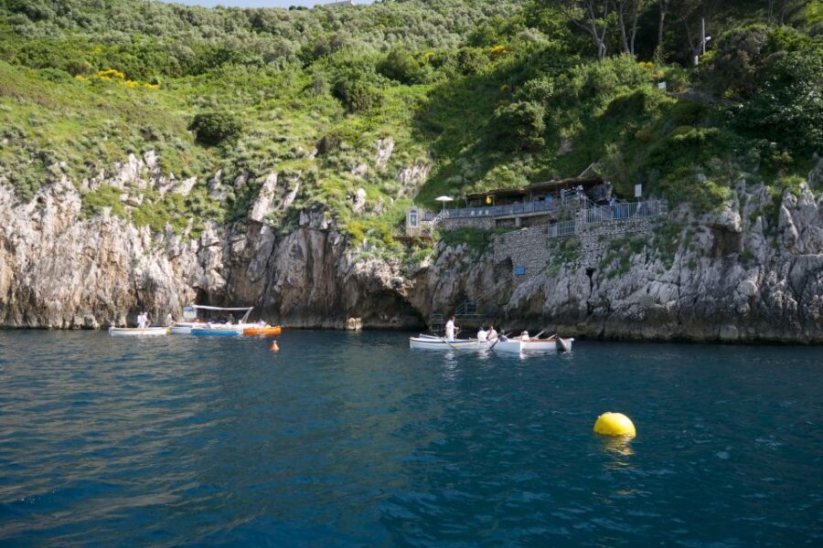 Capri: Island Sightseeing Tour with Blue Grotto Stop - Punta Carena, lighthouse views, and the stories behind the cliffs
