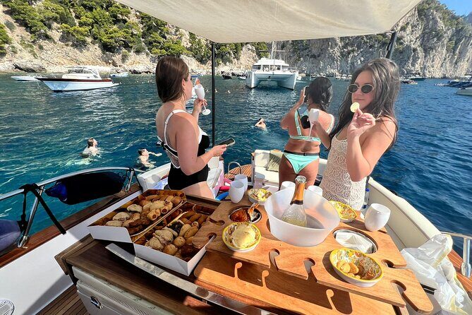 Capri Premium Boat Tour and City Visit Free Bar and Aperitif - Swim breaks and snorkeling gear: how to make the water time worth it