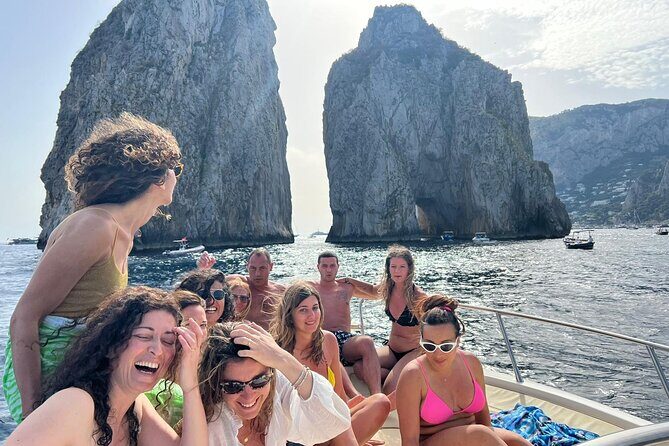 Capri Premium Private Boat Tour + City Visit - Saints, Green, White, Red: the grotto circuit that keeps moving