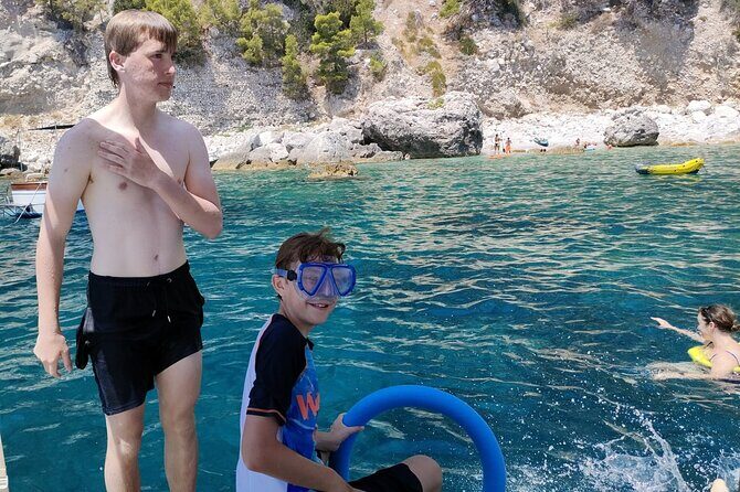 Capri Premium Private Boat Tour + City Visit - Punta Ventroso aperitif break: music, snacks, and a toast