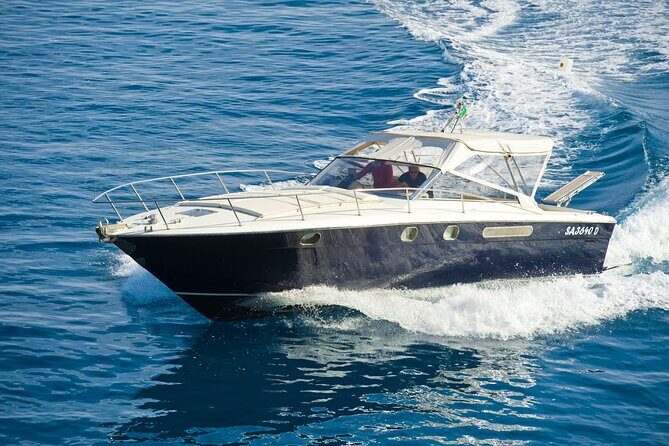 Capri Private Boat Excursion with Faraglioni and Blue Grotto - Faraglioni: The 100-Meter Rock Tower Time Slot