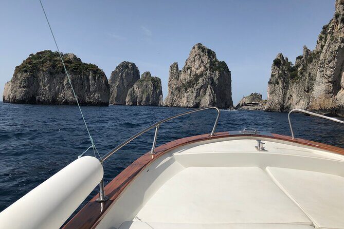 Capri Private Boat Tour from Capri (3 Hours) with Blue Grotto - Faraglioni First: Cliffs, Coast Views, and Photo Time That Actually Works