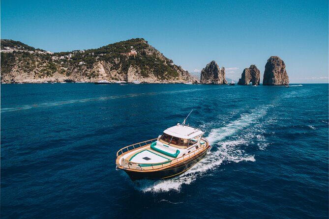 Capri Private Boat Tour from Sorrento, Positano or Naples - Gozzo F.lli Aprea 36 - Swimming, snorkeling, and the onboard break