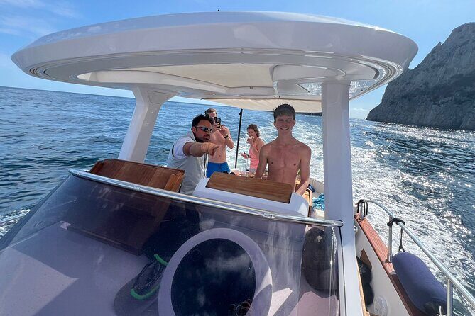 Capri Secret Corners by Private Boat with Local Skipper - Fortini Trail Side Swims: Cala del Rio, Grotta Iannarella, and Cala del Tombosiello