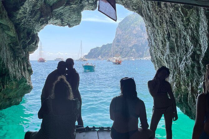 Capri Secret Corners Semi-Private Boat Tour with Local Captain - The vibe on board: semi-private, music-on, drinks-in-hand