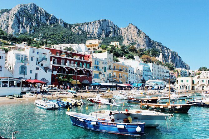 Capri Semi-Private Boat Tour and City Visit from Sorrento - The included shore-time icons: Scugnizzo statue and Tiberius lore