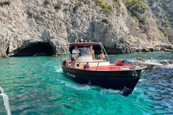 Capri tour with "Gozzo" (3 hours) - Faraglioni from the water: why this stop lands