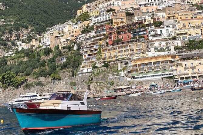 Day on a private boat on the Amalfi Coast - Positano for about two hours: cliffs, steps, and ocean views