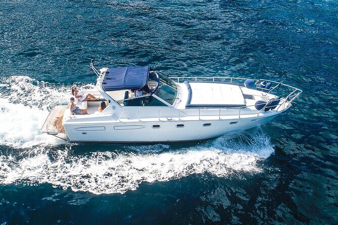 Exclusive Private Capri Boat Tour from Sorrento – Swim & Explore - Faraglioni from the water: the landmark that earns its fame