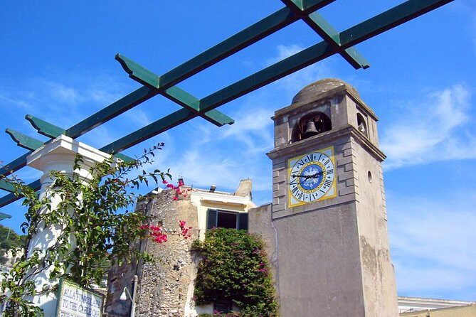 From Amalfi Coast: Capri & Anacapri guided tour by sea & by land - Capri Town walking tour: Piazzetta, Via delle Camerelle, and shortcuts