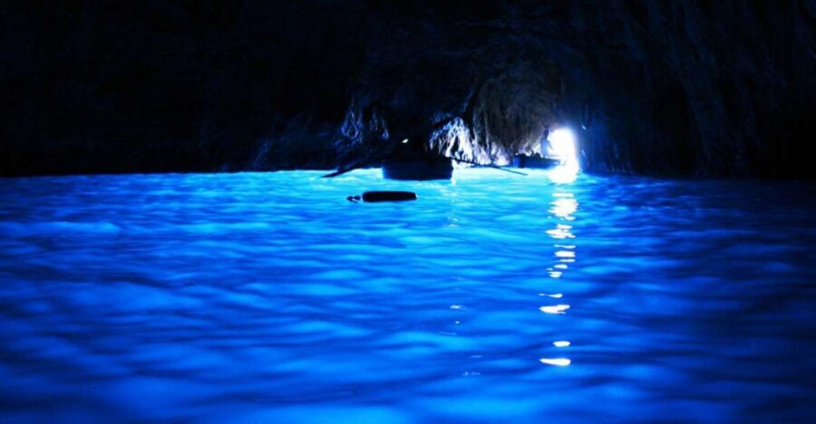 From Naples: Blue Grotto and Capri Trip - Blue Grotto reality: the rowboat trip and the 5-minute inside visit