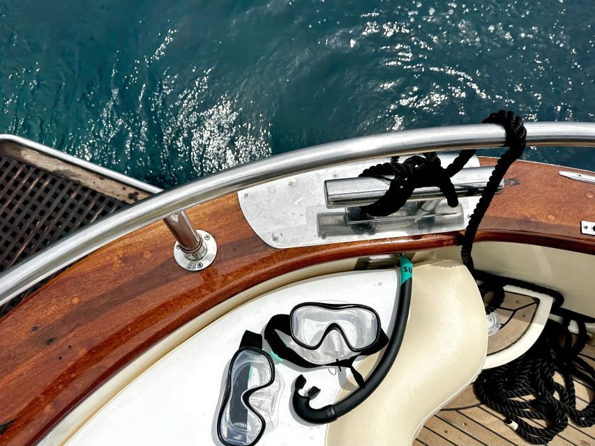 From Positano: Half-Day Amalfi Coast Boat Tour & Snorkeling - Onboard comfort: drinks, fruit, and practical extras