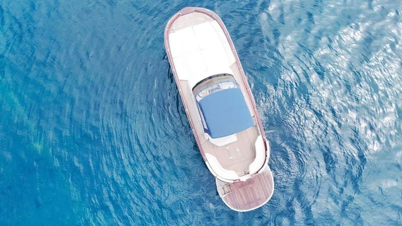 From Sorrento: Capri Boat Cruise with Swimming and Prosecco - What you really pay: base price plus Capri fees