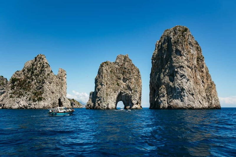 From Sorrento: Capri Boat Tour with Blue Grotto Visit - Punta Carena Lighthouse and the “Capri skyline” from the water