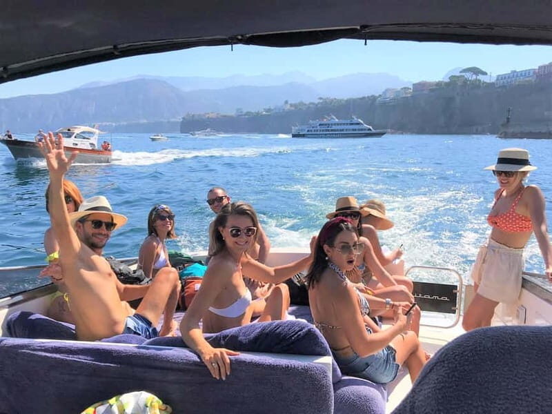 From Sorrento: Full-Day Boat Tour to Capri with Drinks - Faraglioni and the lighthouse views: your photo stops with a purpose