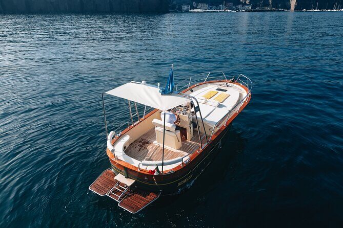 Full-Day Private Capri Boat Tour - Capri time on land: Piazzetta strolls, Gardens of Augustus, and Anacapri options