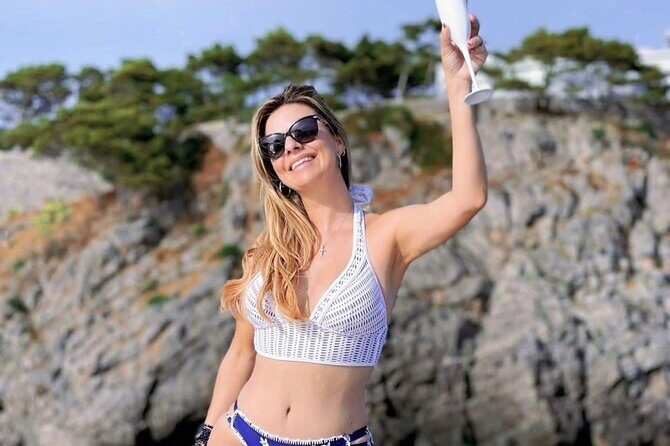 Full day Private Capri boat tour from Positano - I Faraglioni and the Punta Carena Lighthouse: iconic views, real photo time