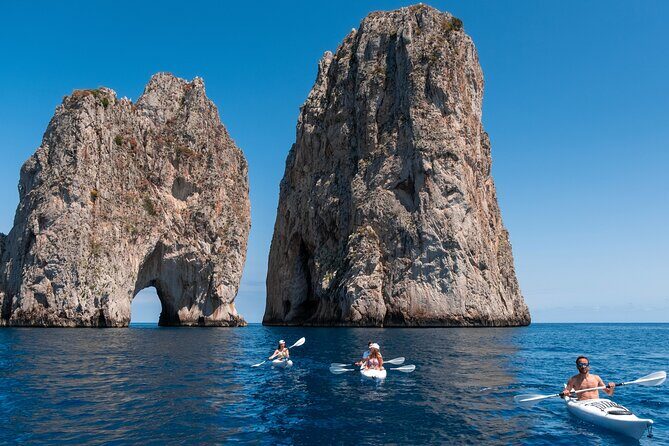 Kayak tour in Capri between caves and beaches. Photos included. - The Swim Stop: Optional Refresh, Wet Reality