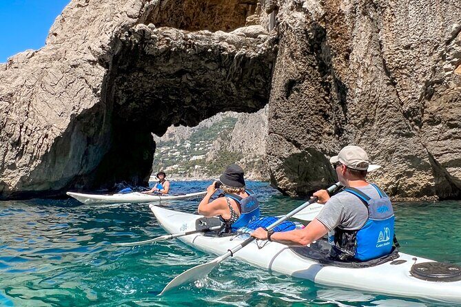 Kayak tour in Capri between caves and beaches. Photos included. - Arco della Stella and Faraglioni: Up Close and Personal
