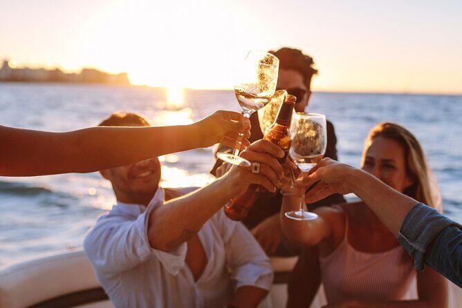 Luxury Capri Dining Experience & Aperitif with Yacht Transfer - Capri’s open-top taxi and dinner view of Faraglioni