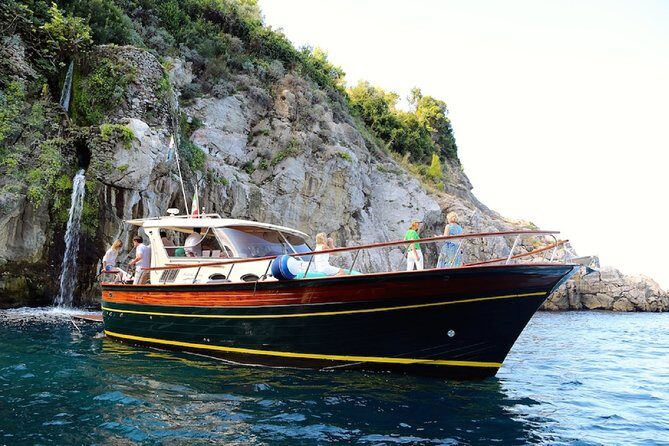 Positano & Amalfi Boat Tour from Sorrento: Swim & Light Lunch - From Marina Grande to Roman ruins near Bagni della Regina Giovanna