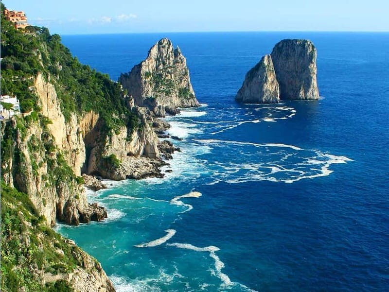 Positano: Capri Boat Tour with Swimming, Drinks, and Snacks - Punta Campanella swim stop: wild coastline, built-in water time
