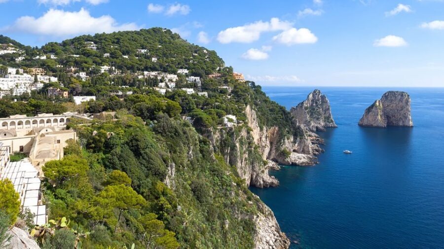 Positano: Small-Group Boat Excursion to Capri Island - Capri by sea: the signature grottos, Faraglioni, and the Villa Malaparte look