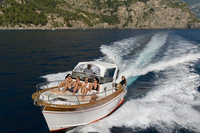 Private Boat Tour To Capri Departing From Positano - Punta Carena, Marina Piccola, and Faraglioni: Capri’s coastline from sea level