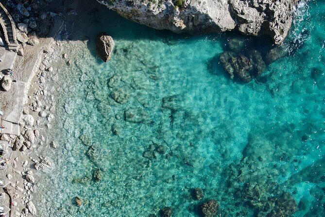 Private boat trip to Capri - Cave of the Coral and the Natural Arch viewpoint