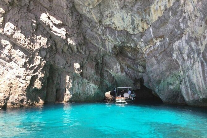 Private Capri Luxury Boat Experience: Cruise, Swim & Sunbathe - Grotto chances and swim stops: Blue Grotto, Green, and White Grottoes