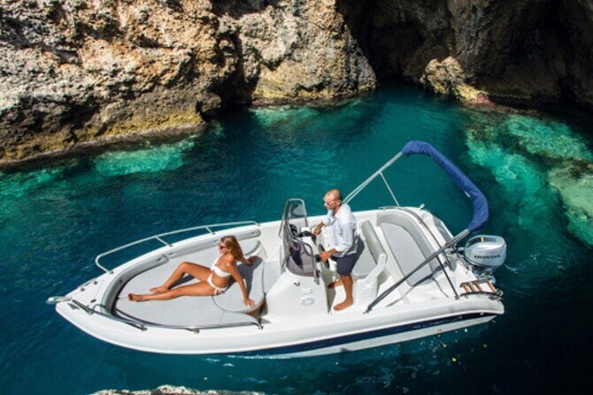 Private Day Boat Trip to Capri and Blue Grotto from Positano - The 7-hour route: grottos, Faraglioni views, and a Capri base at Marina Piccola