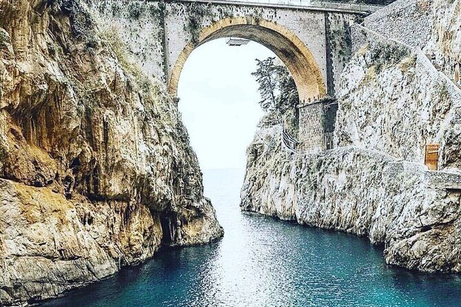 Private Day Boat Trip to Capri and Blue Grotto from Positano - Capri’s Faraglioni area and the Natural Arch stop: photos and breathing room