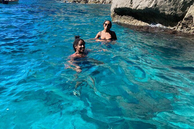 Private Tour of the Island of Capri by Boat and Visit to the Caves - Passing a Lighthouse and Turning Toward the Blue Grotto